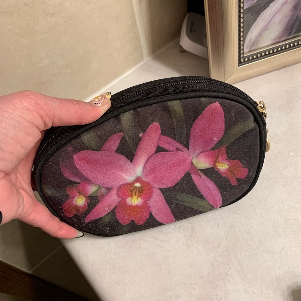 Galleria Enterprises Floral Black and Pink Women's cosmetic or necessities bag.